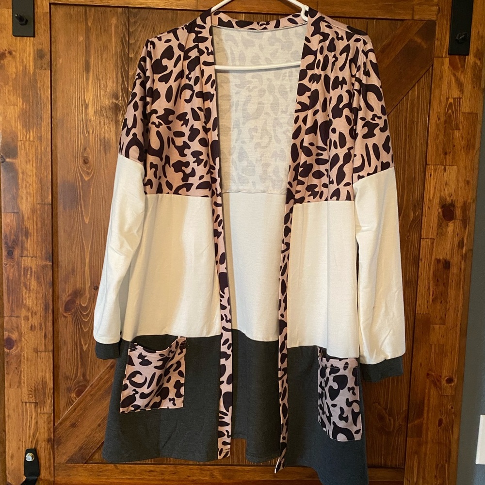 Large boutique cardigan-never worn.  $20